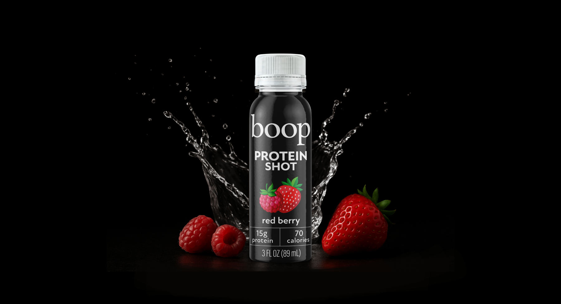 Boop Protein Shot bottle with red berries on a black background