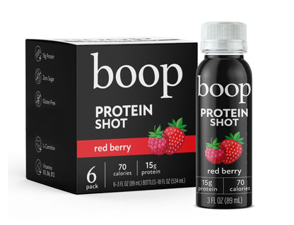 Packaging for boop protein shots in a red berry flavor, displaying the product name, calorie content, and protein information.